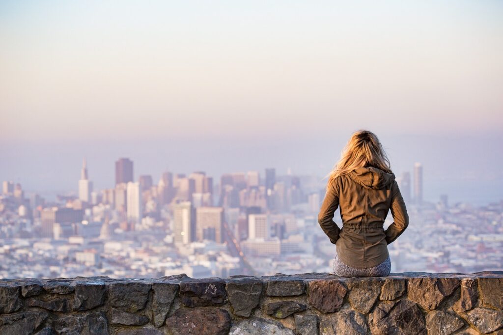 blonde, sitting, wall